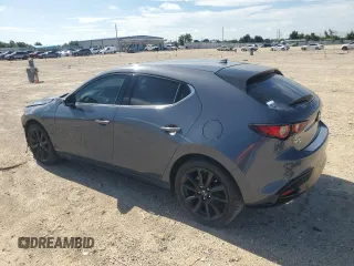 2023 Mazda 3 2.5 Turbo with VIN JM1BPBJY6P1618707, listed as a Copart auction lot 64999854 with 1,671 mi miles and Salvage title. Bid and sale history available at DreamBid. Image 2.