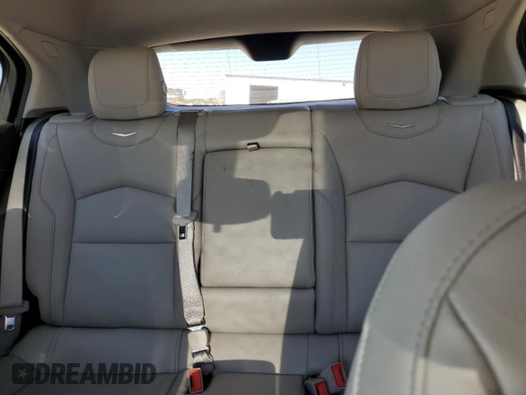 2019 Cadillac XT4 AWD Luxury with VIN 1GYFZBR45KF102731, listed as a Copart auction lot 69534914 with 76,078 mi miles and Salvage Title. Bid and sale history available at carsss.com. Image 10.