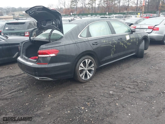 2021 Volkswagen Passat 2.0T SE with VIN 1VWSA7A39MC011751, listed as a IAAI auction lot 41485032 with 999,999 mi miles. Bid and sale history available at carsss.com. Image 4.