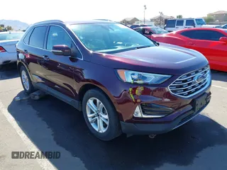 2019 Ford Edge SEL z VIN 2FMPK4J9XKBB10449, wystawiony jako IAAI lot #41614536 z przebiegiem 83 879 mil mil oraz . Historia ofert i sprzedaży dostępna na DreamBid. Obrazek 1.