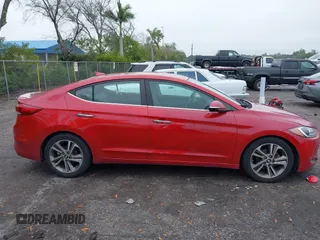 2017 Hyundai Elantra SE z VIN 5NPD84LF7HH052757, wystawiony jako IAAI lot #41409185 z przebiegiem 179 954 mil mil oraz . Historia ofert i sprzedaży dostępna na DreamBid. Obrazek 13.