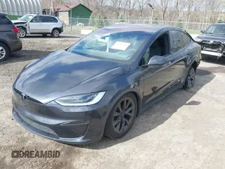 2023 Tesla Model X with VIN 7SAXCDE52PF425834, listed as a IAAI auction lot 41996298 with Not Provided miles and . Bid and sale history available at DreamBid. Image 18.