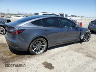 2022 Tesla Model 3 Long Range z VIN 5YJ3E1EBXNF263832, wystawiony jako Copart lot #57177445 z przebiegiem Nie podano mil oraz Szkoda całkowita • Salvage title. Historia ofert i sprzedaży dostępna na DreamBid. Obrazek 3.
