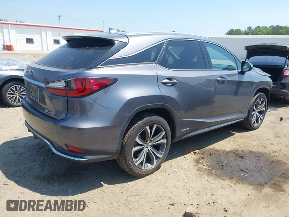 2021 Lexus RX 450h with VIN 2T2HGMDA6MC065516, listed as a IAAI auction lot 42162407 with 81,501 mi miles and . Bid and sale history available at DreamBid. Image 4.