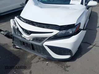 2022 Toyota Camry SE with VIN 4T1G11AKXNU070473, listed as a IAAI auction lot 41937541 with 57,598 mi miles and . Bid and sale history available at DreamBid. Image 18.