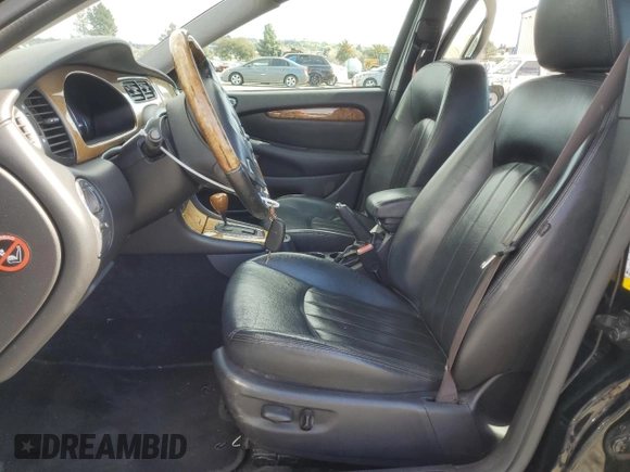 2004 Jaguar X-Type with VIN SAJEA51C74WD56736, listed as a Copart auction lot 48038295 with 115,817 mi miles and Salvage Title. Bid and sale history available at DreamBid. Image 7.