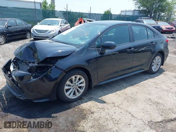 2024 Toyota Corolla LE with VIN 5YFB4MDE8RP188103, listed as a IAAI auction lot 42416138 with 20,474 mi miles and . Bid and sale history available at DreamBid. Image 2.