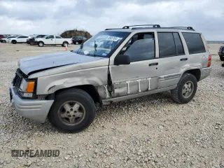1998 Jeep Grand Cherokee with VIN 1J4FX48S6WC345358, listed as a Copart auction lot 85057454 with Not provided miles and Salvage title. Bid and sale history available at DreamBid. Image 1.