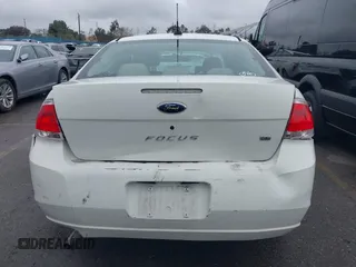 2009 Ford Focus SE z VIN 1FAHP35N19W114402, wystawiony jako IAAI lot #41510501 z przebiegiem Nie podano mil oraz . Historia ofert i sprzedaży dostępna na DreamBid. Obrazek 17.