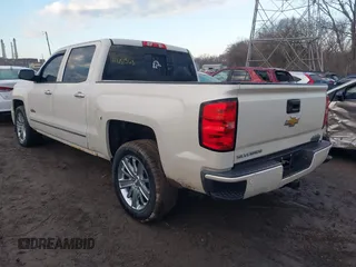 2014 Chevrolet Silverado 1500 High Country with VIN 3GCUKTEC5EG407573, listed as a IAAI auction lot 41651363 with 136,239 mi miles. Bid and sale history available at carsss.com. Image 3.