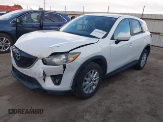 2014 Mazda CX-5 Touring with VIN JM3KE2CY8E0321578, listed as a IAAI auction lot 41769930 with 101,724 mi miles. Bid and sale history available at carsss.com. Image 2.