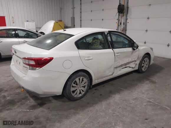 2020 Subaru Impreza with VIN 4S3GKAB63L3603530, listed as a IAAI auction lot 41609130 with 56,066 mi miles. Bid and sale history available at carsss.com. Image 4.