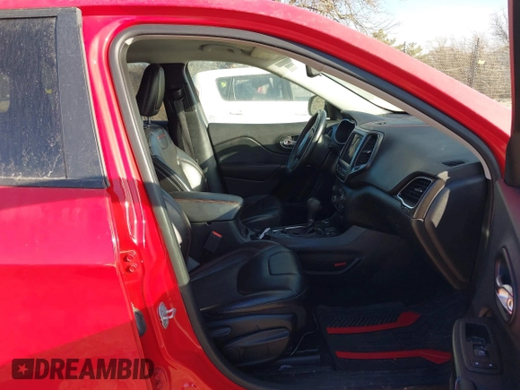 2019 Jeep Cherokee Trailhawk Elite with VIN 1C4PJMBX3KD217437, listed as a IAAI auction lot 41448614 with 85,889 mi miles. Bid and sale history available at carsss.com. Image 5.