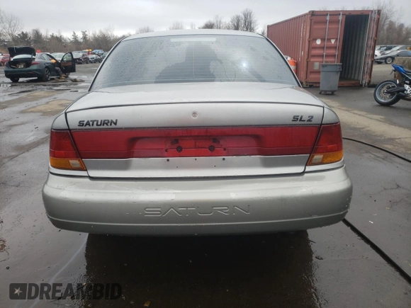 1996 Saturn SL with VIN 1G8ZK5272TZ265571, listed as a Copart auction lot 51267475 with 142,824 mi miles and Salvage Title. Bid and sale history available at carsss.com. Image 6.