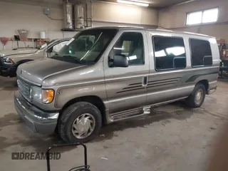2002 Ford Econoline Cargo Recreational with VIN 1FDRE14L22HB53224, listed as a IAAI auction lot 41967017 with 202,065 mi miles. Bid and sale history available at carsss.com. Image 17.