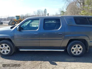 2013 Honda Ridgeline RTS with VIN 5FPYK1F4XDB001703, listed as a IAAI auction lot 41800808 with 146,944 mi miles. Bid and sale history available at carsss.com. Image 14.