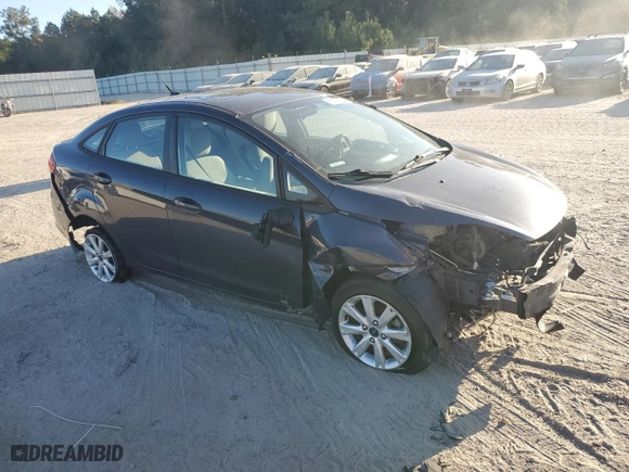 2012 Ford Fiesta SE with VIN 3FADP4BJ2CM156185, listed as a Copart auction lot 76785724 with NaN miles and Salvage Title. Bid and sale history available at carsss.com. Image 4.
