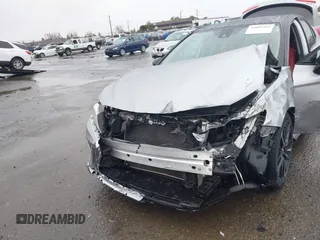 2020 Toyota Camry XSE with VIN 4T1K61AK1LU318098, listed as a IAAI auction lot 41097712 with 64,118 mi miles and . Bid and sale history available at DreamBid. Image 6.