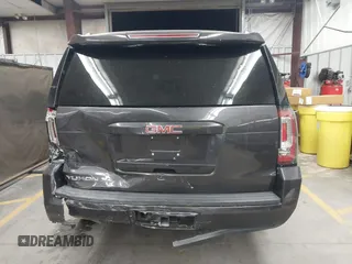 2018 GMC Yukon XL SLT Standard Edition with VIN 1GKS2JKCXJR376058, listed as a IAAI auction lot 41507544 with 110,299 mi miles. Bid and sale history available at carsss.com. Image 16.