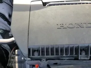 2023 Honda Pilot Elite with VIN 5FNYG1H82PB024617, listed as a Copart auction lot 55943805 with 53,461 mi miles and Salvage title. Bid and sale history available at DreamBid. Image 16.