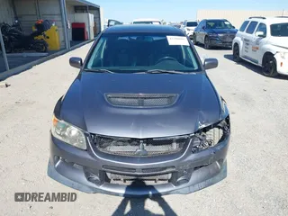 2006 Mitsubishi Lancer Evolution IX с VIN JA3AH86C56U016823, выставлен на аукционе IAAI как лот 42298601 с пробегом 144 171 миль миль и . История ставок и продаж доступна на DreamBid. Изображение 12.