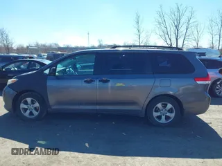 2011 Toyota Sienna with VIN 5TDZK3DC6BS125737, listed as a IAAI auction lot 41815233 with 248,318 mi miles. Bid and sale history available at carsss.com. Image 14.
