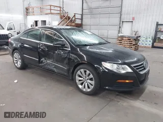 2012 Volkswagen CC Sport PZEV with VIN WVWMP7AN8CE537805, listed as a IAAI auction lot 41847051 with 147,095 mi miles. Bid and sale history available at carsss.com. Image 1.