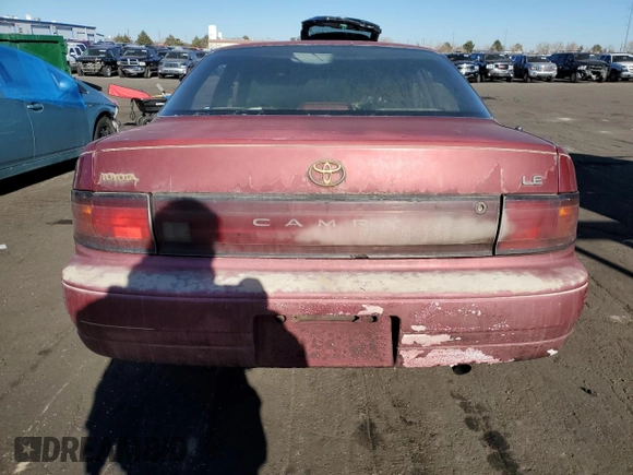 1993 Toyota Camry LE with VIN JT2SK12E8P0149731, listed as a Copart auction lot 83082154 with 197,590 mi miles and Salvage Title. Bid and sale history available at carsss.com. Image 6.
