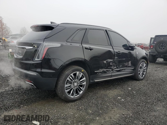 2020 Cadillac XT5 Sport AWD with VIN 1GYKNGRS5LZ232546, listed as a Copart auction lot 84104644 with 25,276 mi miles and Salvage title. Bid and sale history available at DreamBid. Image 3.