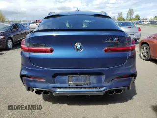 2020 BMW X4 M Competition z VIN 5YMUJ0C04L9C08841, wystawiony jako Copart lot #49825004 z przebiegiem 26 071 mil mil oraz . Historia ofert i sprzedaży dostępna na DreamBid. Obrazek 6.