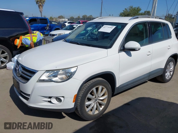 2011 Volkswagen Tiguan SEL with VIN WVGBV7AXXBW554267, listed as a IAAI auction lot 42773354 with 70,547 mi miles and . Bid and sale history available at DreamBid. Image 2.