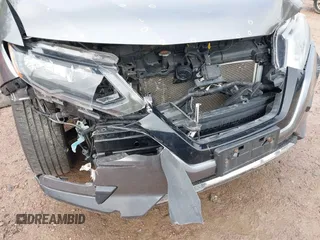 2017 Nissan Rogue SV with VIN KNMAT2MV4HP598576, listed as a IAAI auction lot 42061966 with 125,171 mi miles. Bid and sale history available at carsss.com. Image 6.