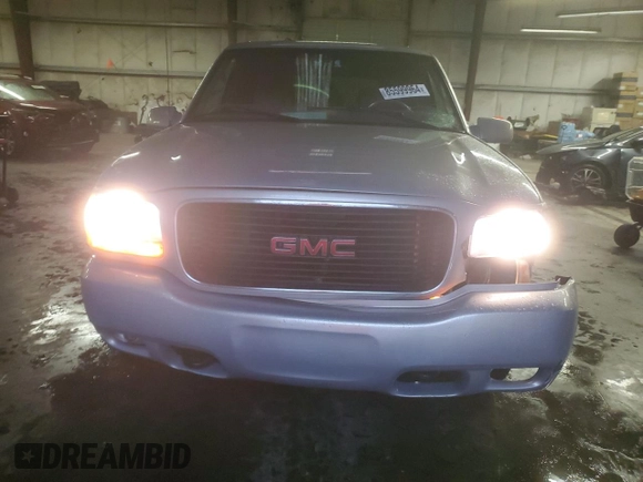 2000 GMC Denali z VIN 1GKEK13R9YR104210, wystawiony jako Copart lot #85599964 z przebiegiem 1 548 394 mil mil oraz Szkoda całkowita • Salvage title. Historia ofert i sprzedaży dostępna na DreamBid. Obrazek 5.