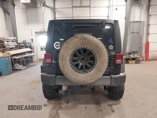 2017 Jeep Wrangler Unlimited Sport with VIN 1C4BJWDGXHL698014, listed as a IAAI auction lot 41384325 with 121,402 mi miles. Bid and sale history available at carsss.com. Image 17.