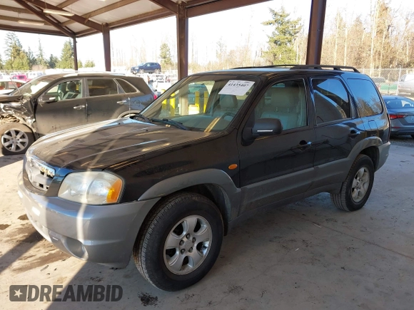 2002 Mazda Tribute LX with VIN 4F2CU08172KM58561, listed as a IAAI auction lot 41435407 with 141,908 mi miles and . Bid and sale history available at carsss.com. Image 17.