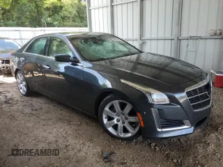 2014 Cadillac CTS Performance RWD with VIN 1G6AS5S37E0140091, listed as a Copart auction lot 60694094 with 130,587 mi miles and Salvage Title. Bid and sale history available at DreamBid. Image 4.
