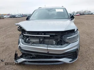 2023 Volkswagen Tiguan SE R-Line Black with VIN 3VV8B7AX3PM130610, listed as a IAAI auction lot 42011131 with 21,980 mi miles and . Bid and sale history available at DreamBid. Image 12.