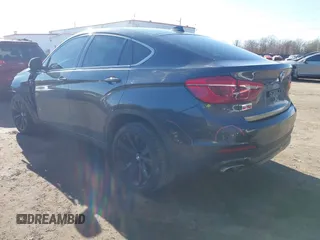 2019 BMW X6 xDrive35i z VIN 5UXKU2C51K0Z64589, wystawiony jako IAAI lot #41537380 z przebiegiem 60 769 mil mil oraz . Historia ofert i sprzedaży dostępna na DreamBid. Obrazek 3.