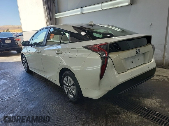 2017 Toyota Prius Two with VIN JTDKARFU6H3047726, listed as a IAAI auction lot 42619600 with 215,918 mi miles and . Bid and sale history available at DreamBid. Image 2.