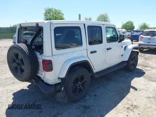 2021 Jeep Wrangler Unlimited Sahara z VIN 1C4HJXEN2MW528137, wystawiony jako IAAI lot #42134514 z przebiegiem 50 030 mil mil oraz . Historia ofert i sprzedaży dostępna na DreamBid. Obrazek 4.