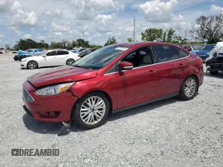2016 Ford Focus Titanium with VIN 1FADP3J29GL274147, listed as a Copart auction lot 61377575 with 88,181 mi miles and Salvage title. Bid and sale history available at DreamBid. Image 1.