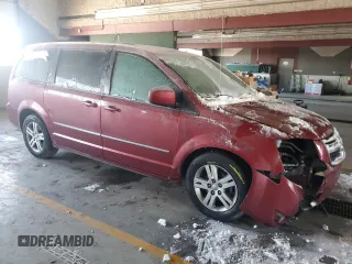 2010 Dodge Grand Caravan Crew with VIN 2D4RN6DX7AR446546, listed as a Copart auction lot 42484005 with 118,104 mi miles and Salvage Title. Bid and sale history available at DreamBid. Image 4.