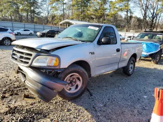 2002 Ford F-150 XL with VIN 1FTRF17202NB11513, listed as a Copart auction lot 85773084 with 120,443 mi miles and Salvage Title. Bid and sale history available at carsss.com. Image 1.
