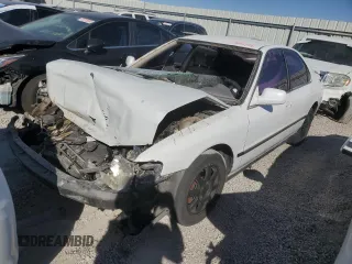 1995 Honda Accord LX with VIN 1HGCD5634SA021951, listed as a Copart auction lot 75093974 with 219,733 mi miles and Salvage Title. Bid and sale history available at carsss.com. Image 1.