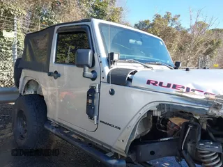 2011 Jeep Wrangler Rubicon with VIN 1J4BA6D10BL514776, listed as a IAAI auction lot 41487396 with 172,208 mi miles. Bid and sale history available at carsss.com. Image 14.