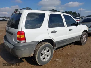 2006 Ford Escape XLT with VIN 1FMYU03176KC35659, listed as a IAAI auction lot 41434315 with 133,746 mi miles. Bid and sale history available at carsss.com. Image 4.
