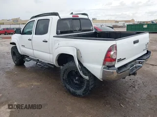 2014 Toyota Tacoma with VIN 3TMLU4EN8EM139665, listed as a IAAI auction lot 41925143 with 190,690 mi miles and . Bid and sale history available at DreamBid. Image 3.