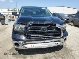 2011 Toyota Tundra 4WD Truck with VIN 5TFUM5F16BX016815, listed as a Copart auction lot 69013034 with 222,395 mi miles and Salvage Title. Bid and sale history available at carsss.com. Image 5.