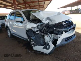 2014 Mazda CX-5 Touring with VIN JM3KE2CY4E0363214, listed as a IAAI auction lot 42191909 with 161,941 mi miles and . Bid and sale history available at DreamBid. Image 1.