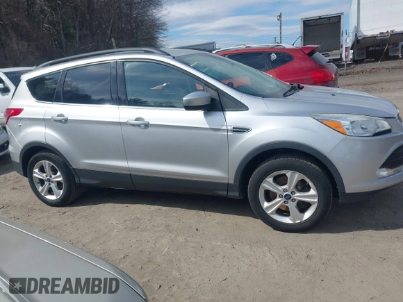 2016 Ford Escape SE with VIN 1FMCU9GXXGUB10447, listed as a IAAI auction lot 41879610 with 137,913 mi miles. Bid and sale history available at carsss.com. Image 13.
